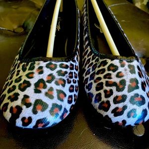 Leopard print vinyl flats. Casual but cool. Size 8.